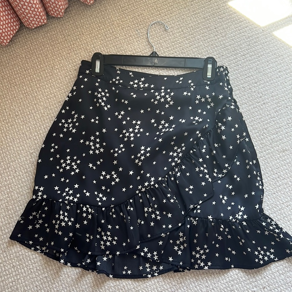 Black star mini skirt